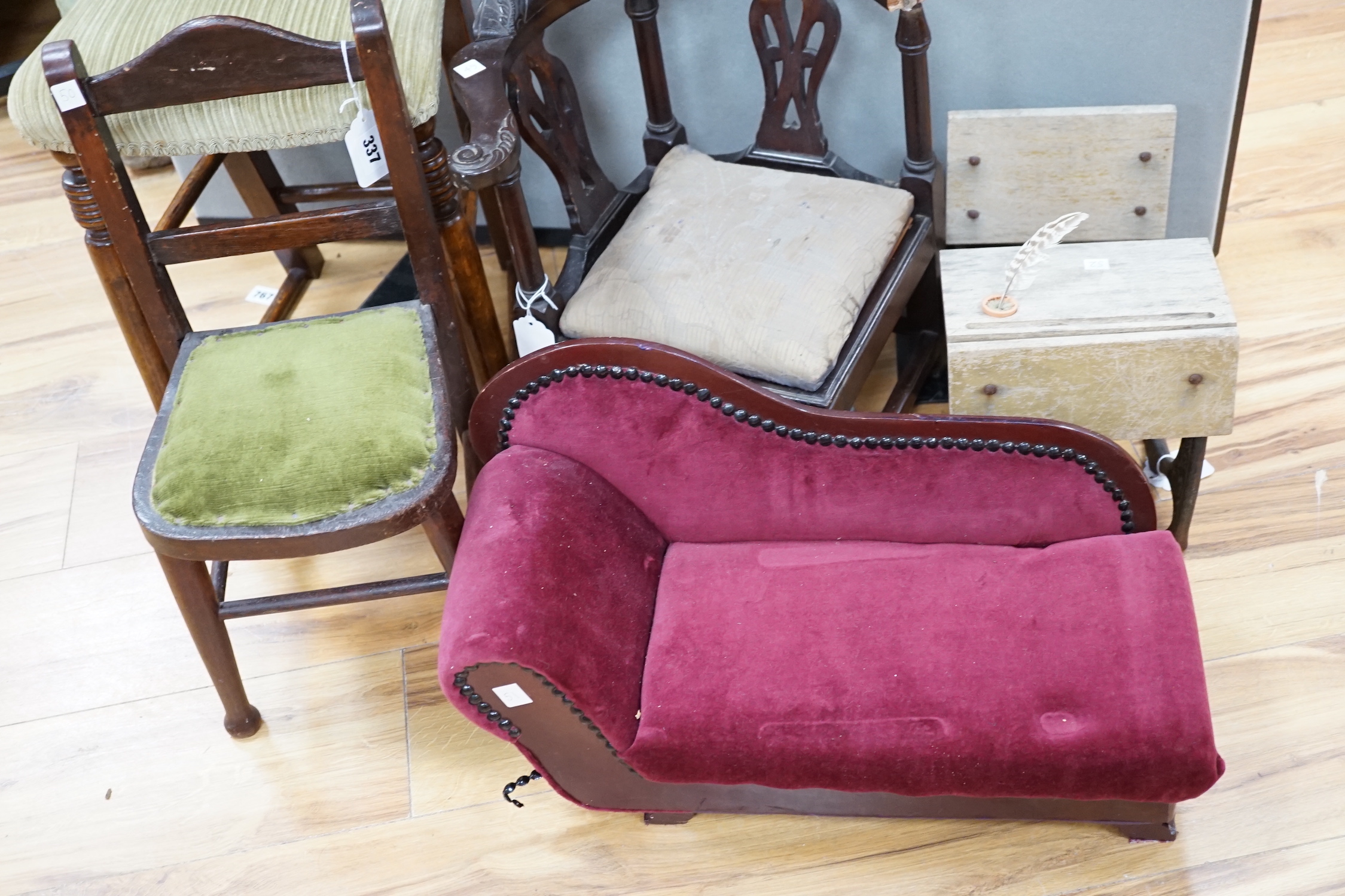 A tall mahogany chair for a doll, together with six pieces of doll's furniture including a chaise longue